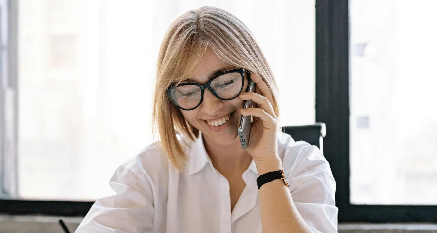 Corporate assistant booking travel from laptop