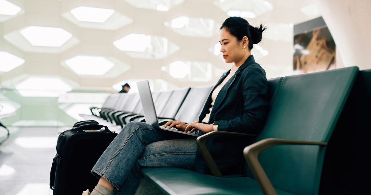 Corporate travel planner arranging Gatwick to Heathrow airport transfer