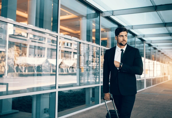 Business traveller booking Gatwick to Heathrow chauffeur transfer
