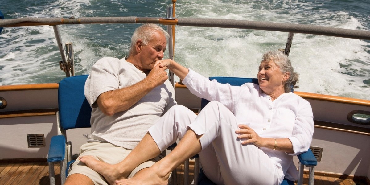 Senior couple travelling with cruise luggage