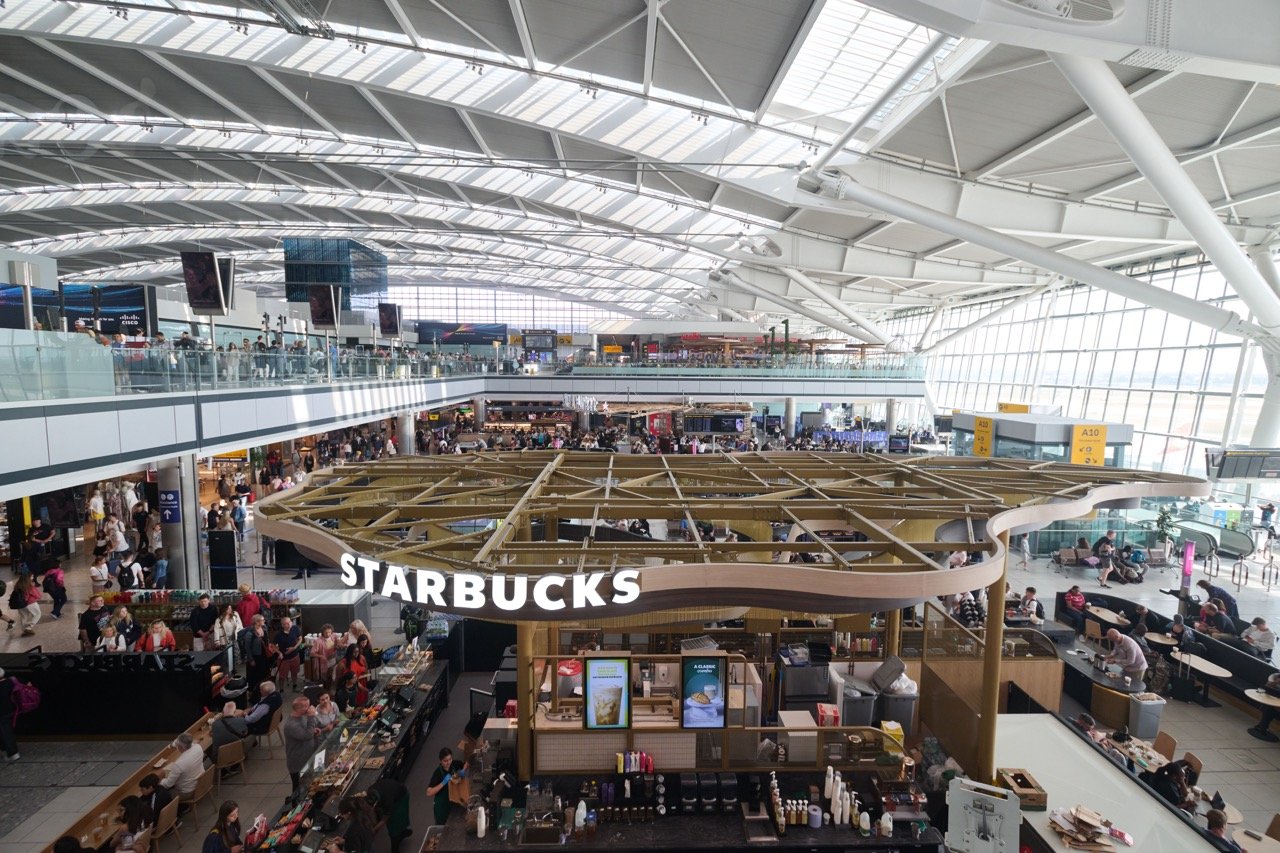 Airport terminal arrivals meeting area used for chauffeur meet and greet guidance
