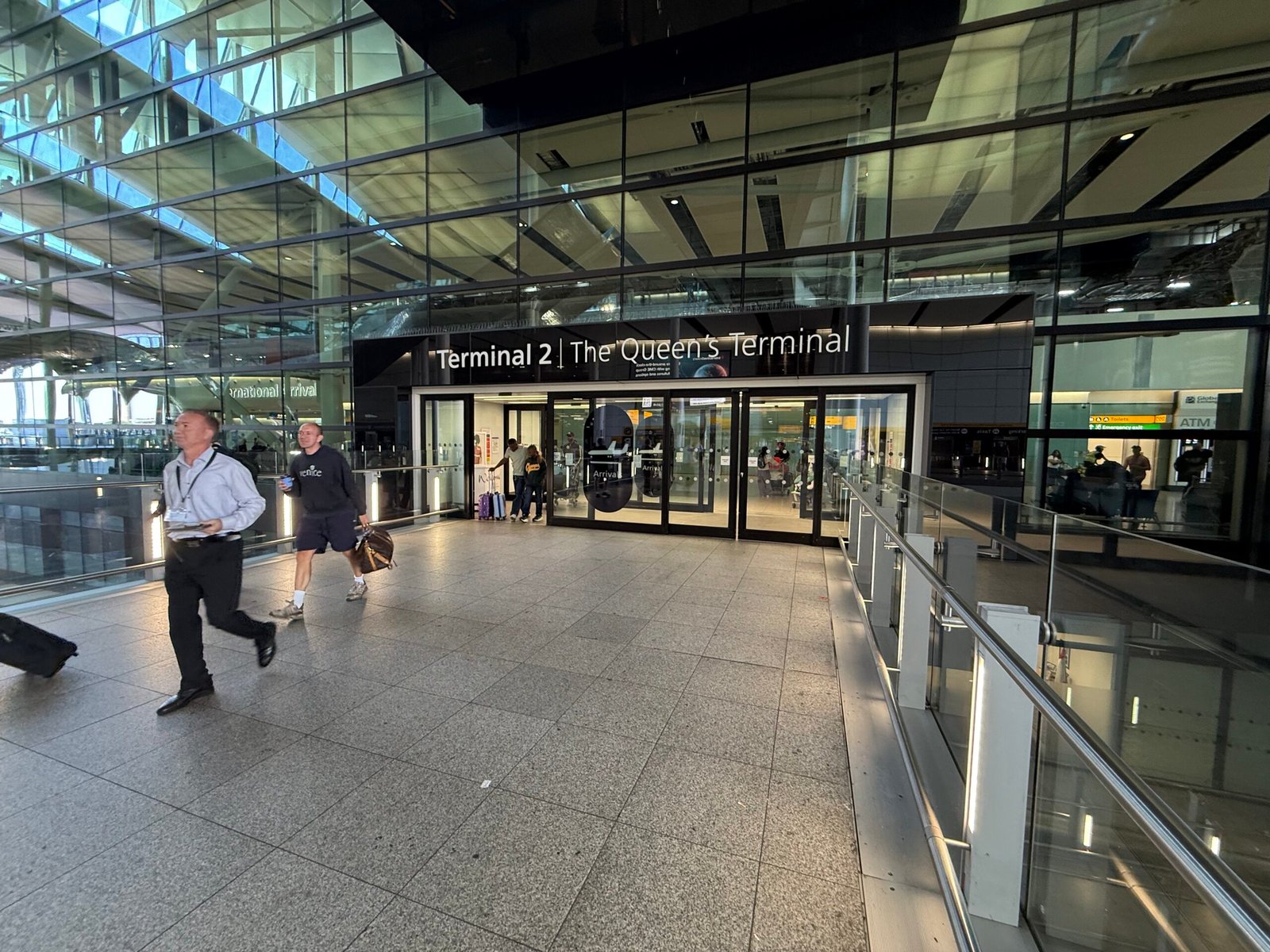 Main entrance used by chauffeurs entering Heathrow Terminal 2 arrivals at the Queen's Terminal